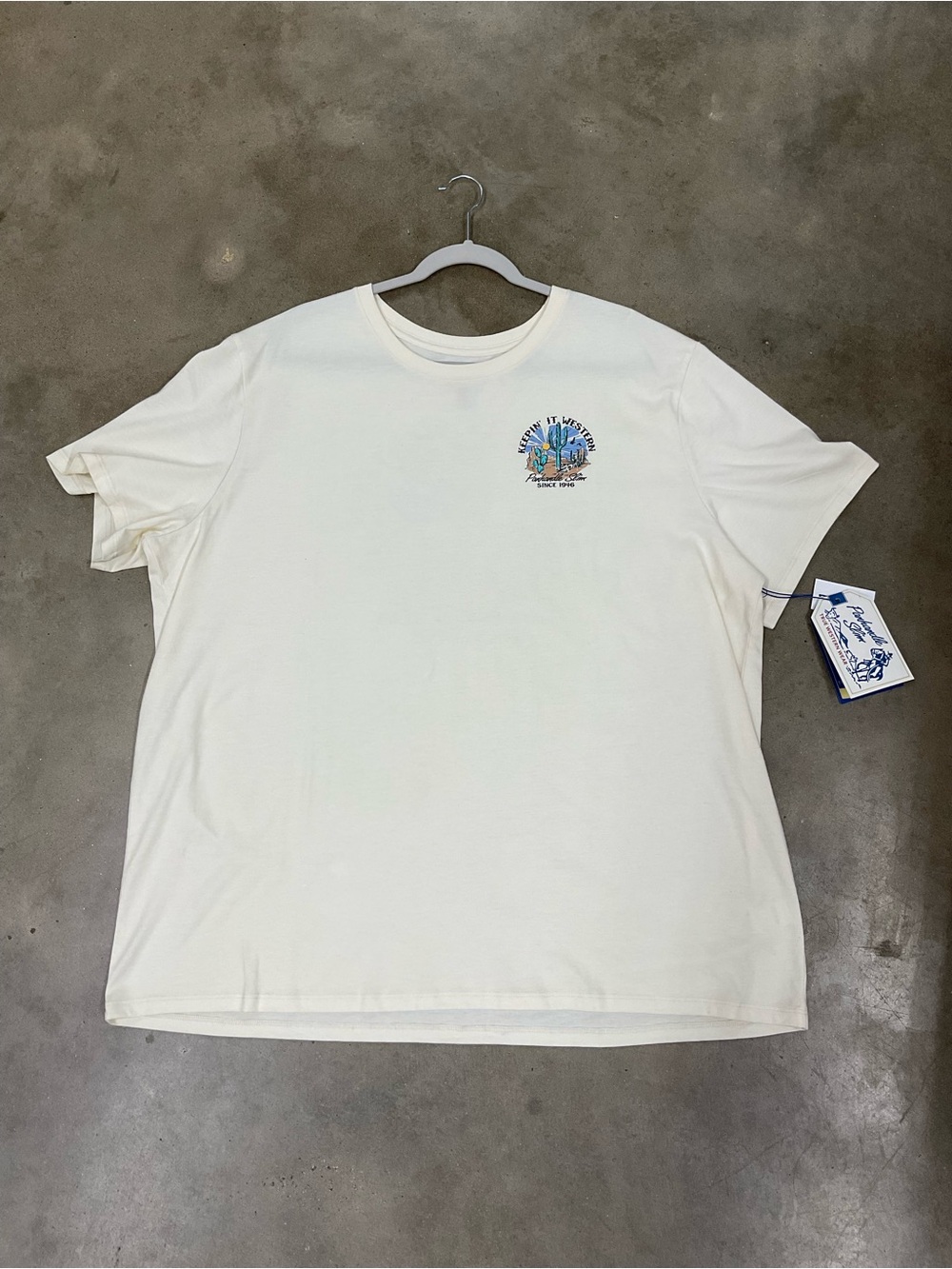 Panhandle Slim Cream Short Sleeve Tee with Small Multicolor Chest Graphic